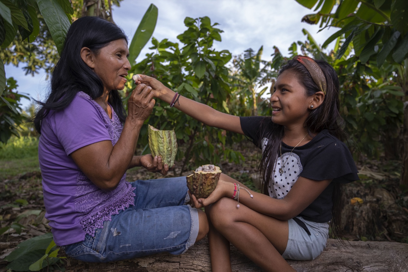 Mother and daughter with cacao